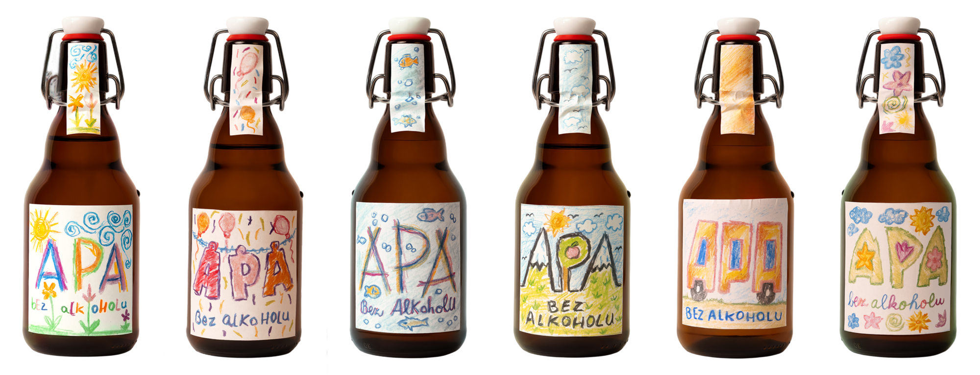 Šesť fliaš APA bez alkoholu s etiketami, ktoré nakreslili deti
